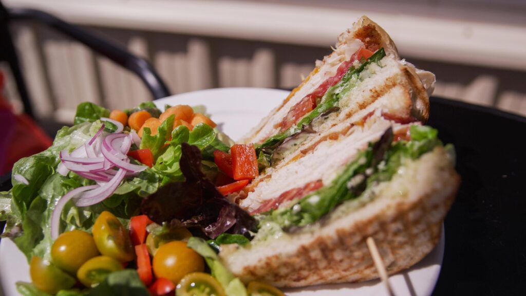 Club sandwich and salad on a plate