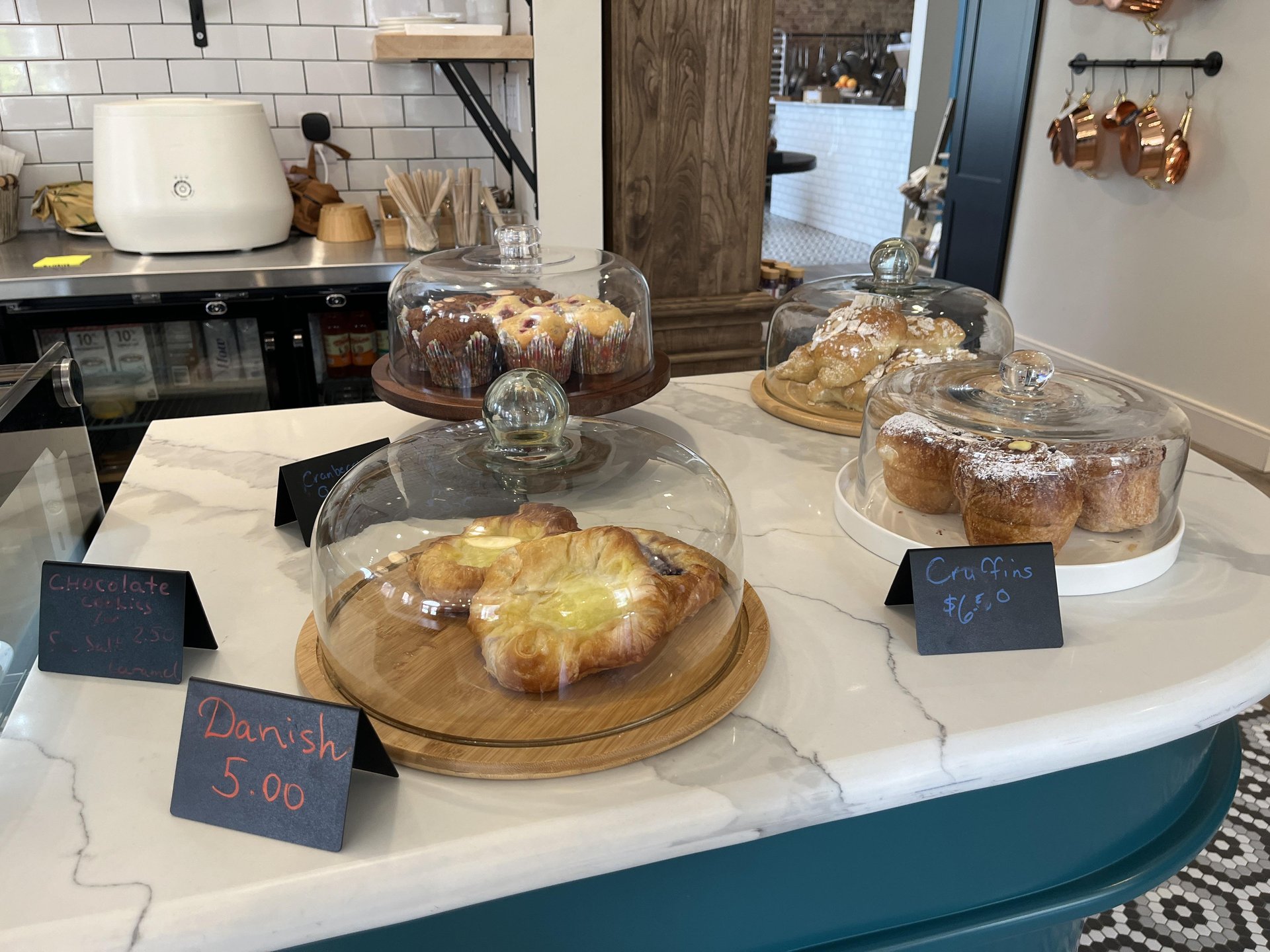 Collection of baked goods on a counter at a café