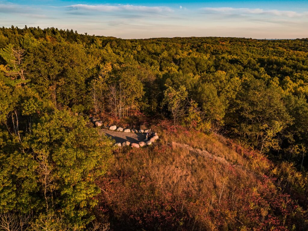 Drone view of a lookout point in Northumberland Forest marked by stones