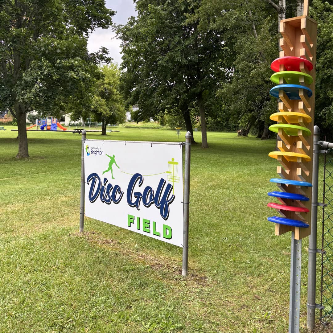 Disc Golf sign and rack of discs at Brighton Disc Golf Park