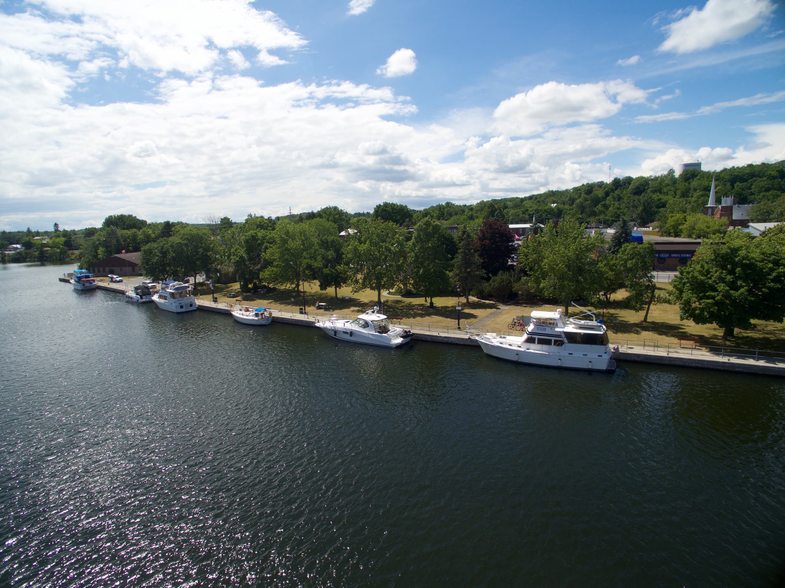 Boats lined up along the shore in Campbellford