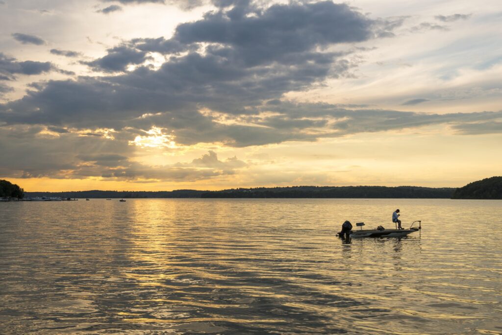 Fishing boat on the water at dusk