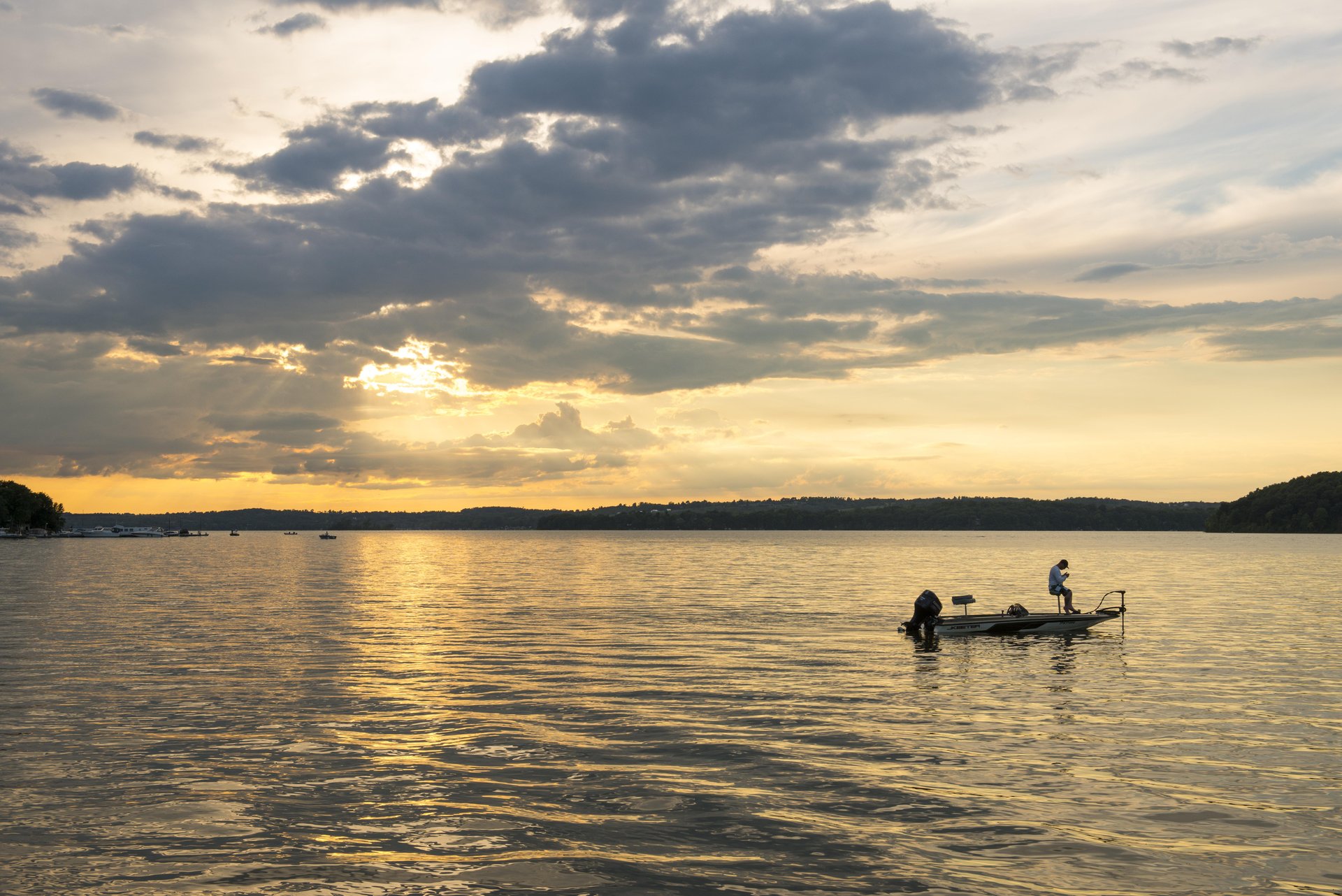 Fishing boat on the water at dusk