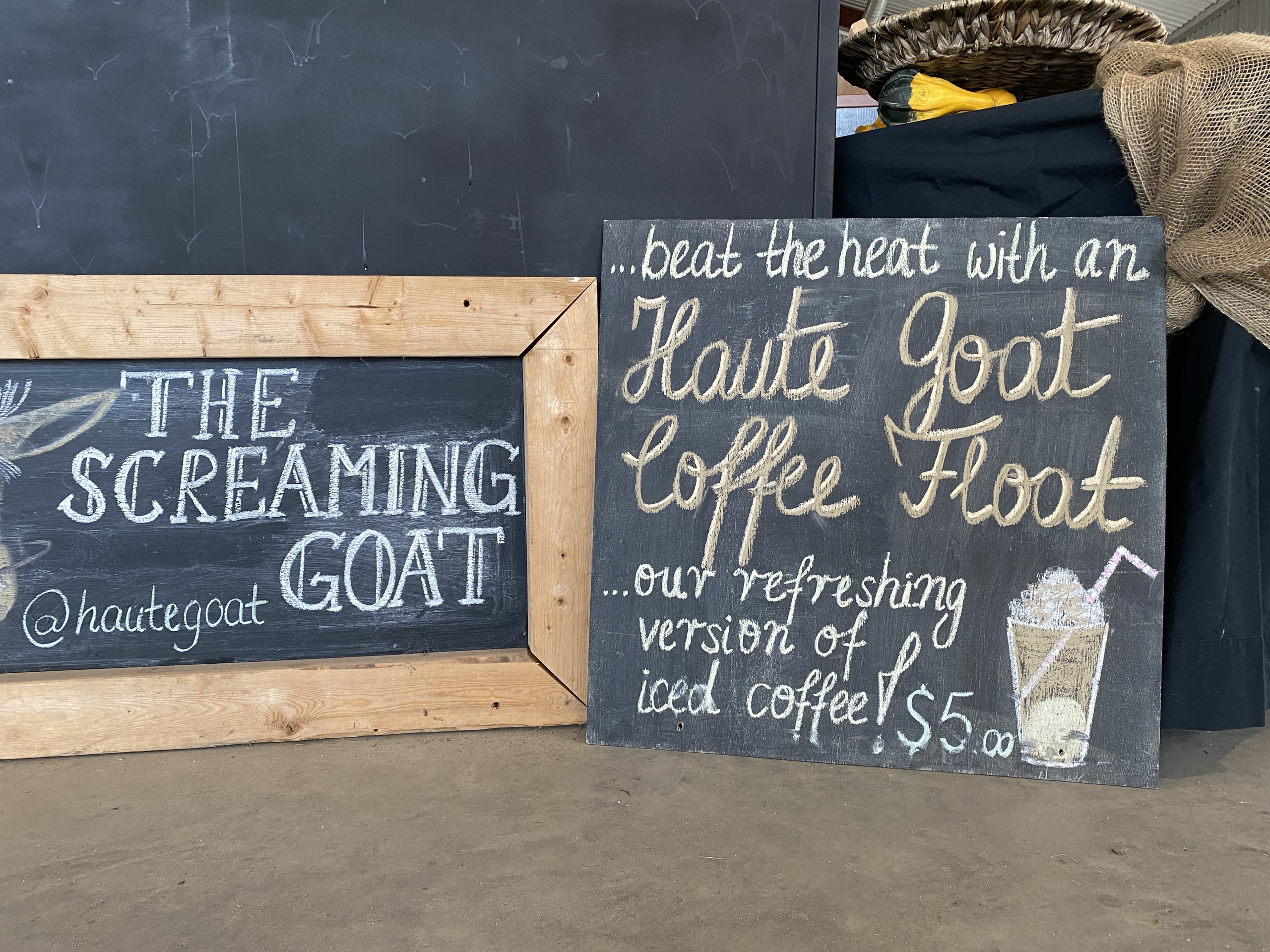 Photo of The Screaming Goat sign. Sign reads "The Screaming Goat. @hautegoat."