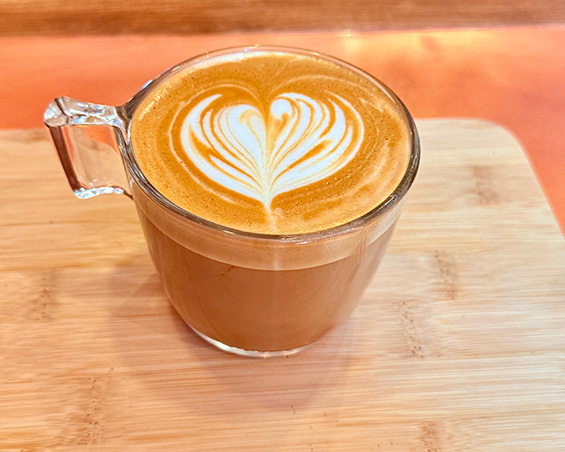 art in foam of a mug of latte