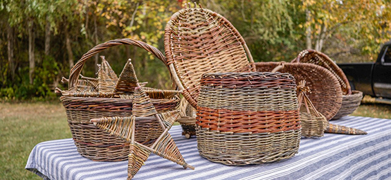 A variety of handmade brown wicker baskets.