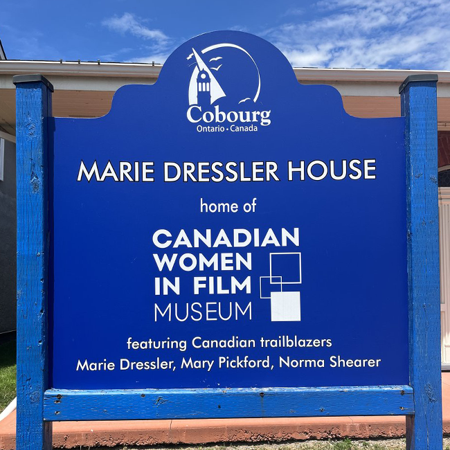 Large blue sign with white writing
