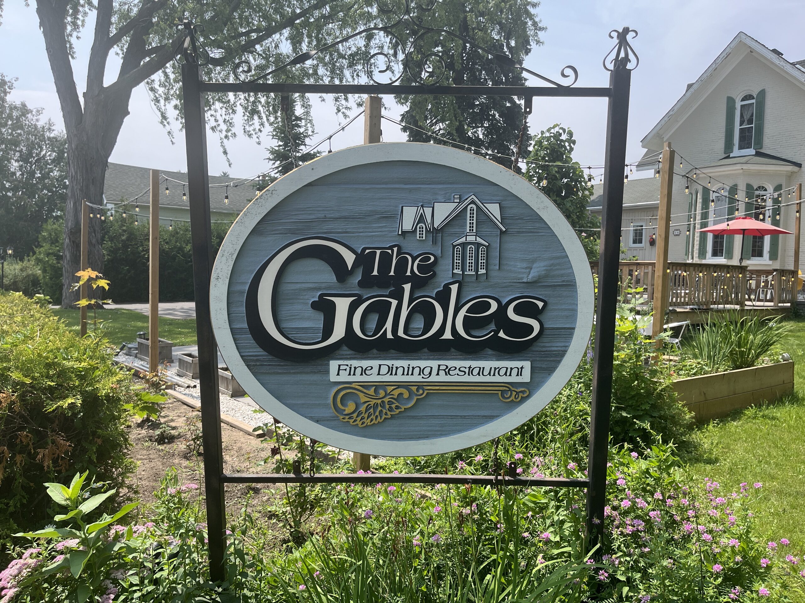 Photo of The Gables Fine Dining Restaurant sign. Sign reads "The Gables Fine Dining Restaurant."