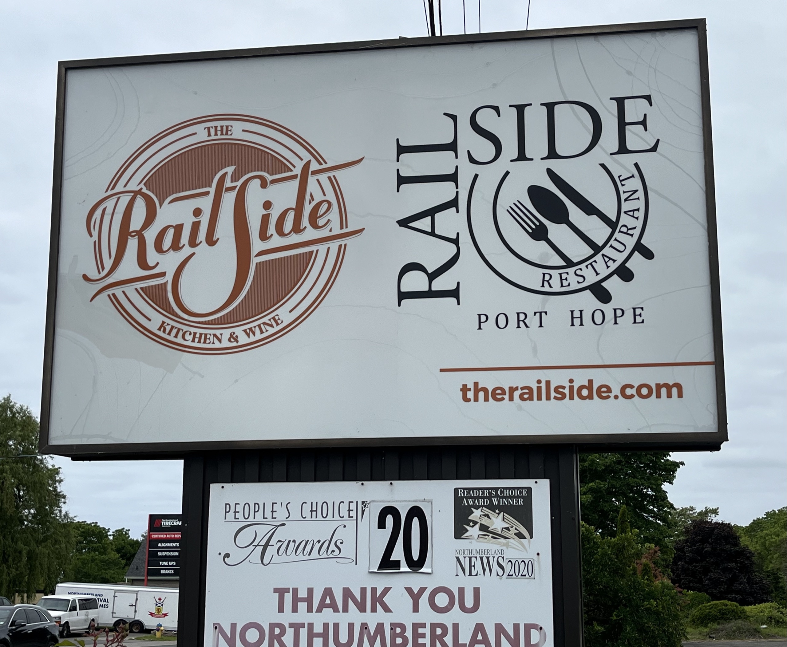 Photo of Railside Restaurant sign. Sign reads "Railside Restaurant Port Hope. therailside.com."