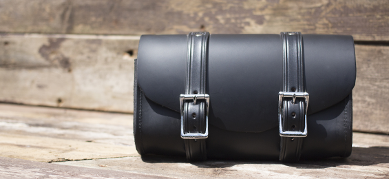 Small black leather with 2 straps.