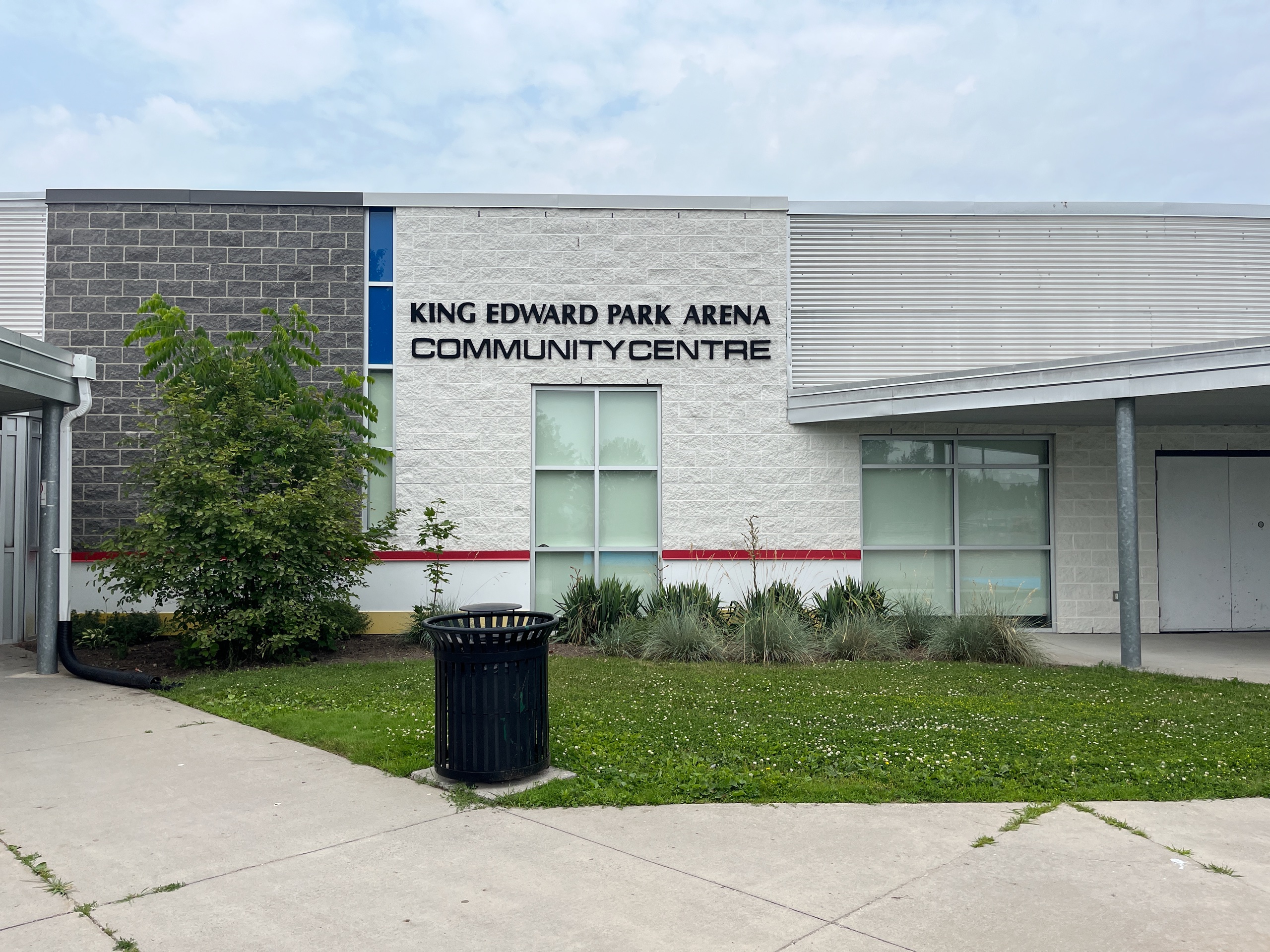 Photo outside of the King Edward Park Arena Community Centre. Sign on the building reads "King Edward Park Arena Community Centre."