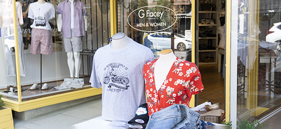2 mannequins in front of a store entrance