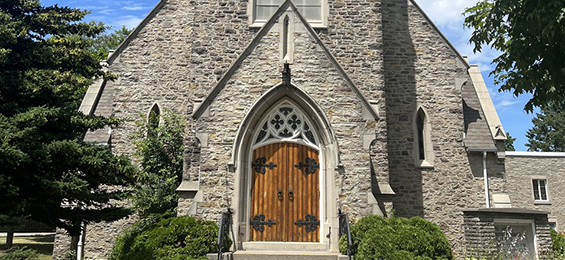 Stone building with wooden doors