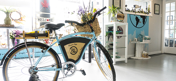 Decorative bicycle displayed in a store.
