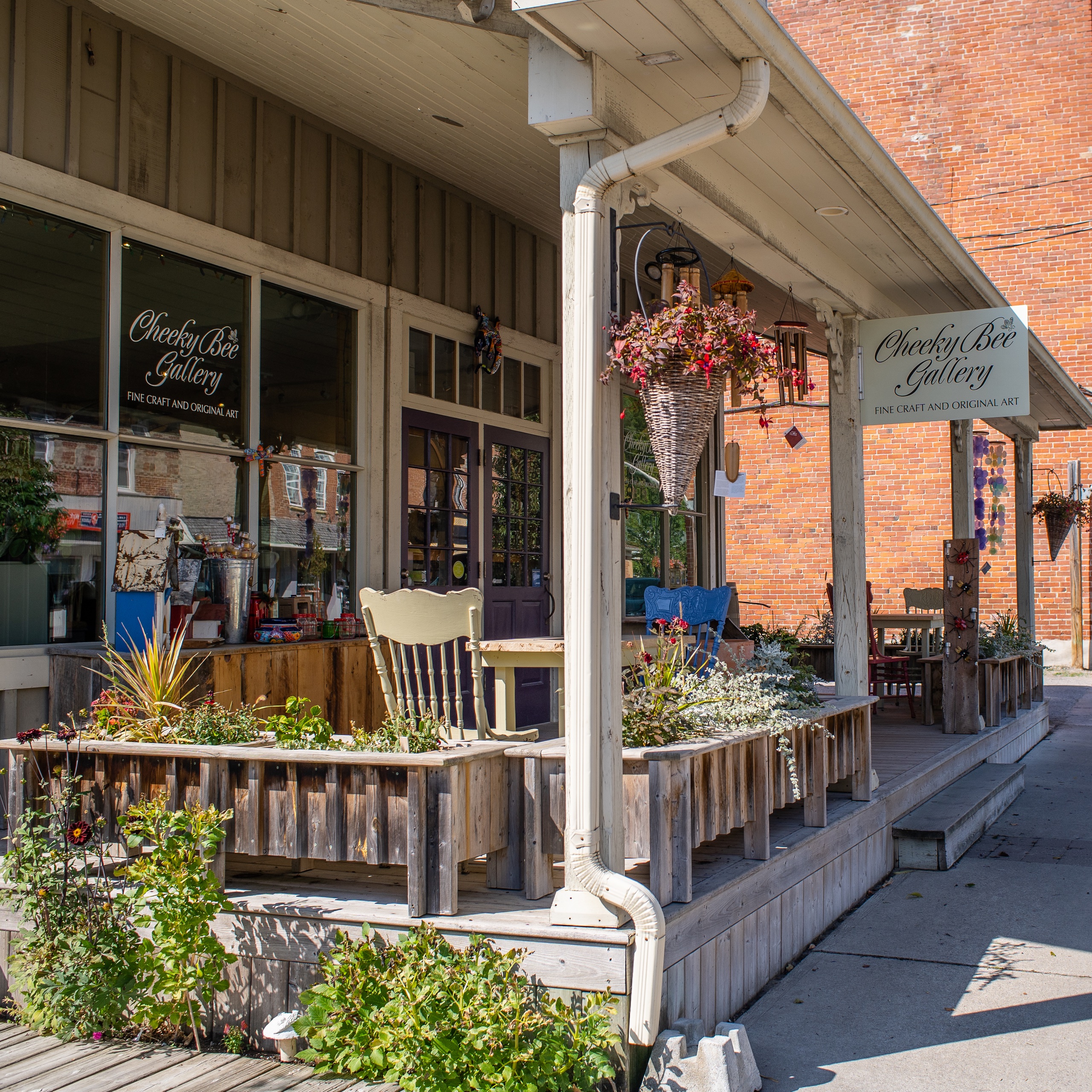 Front porch with plants and products.