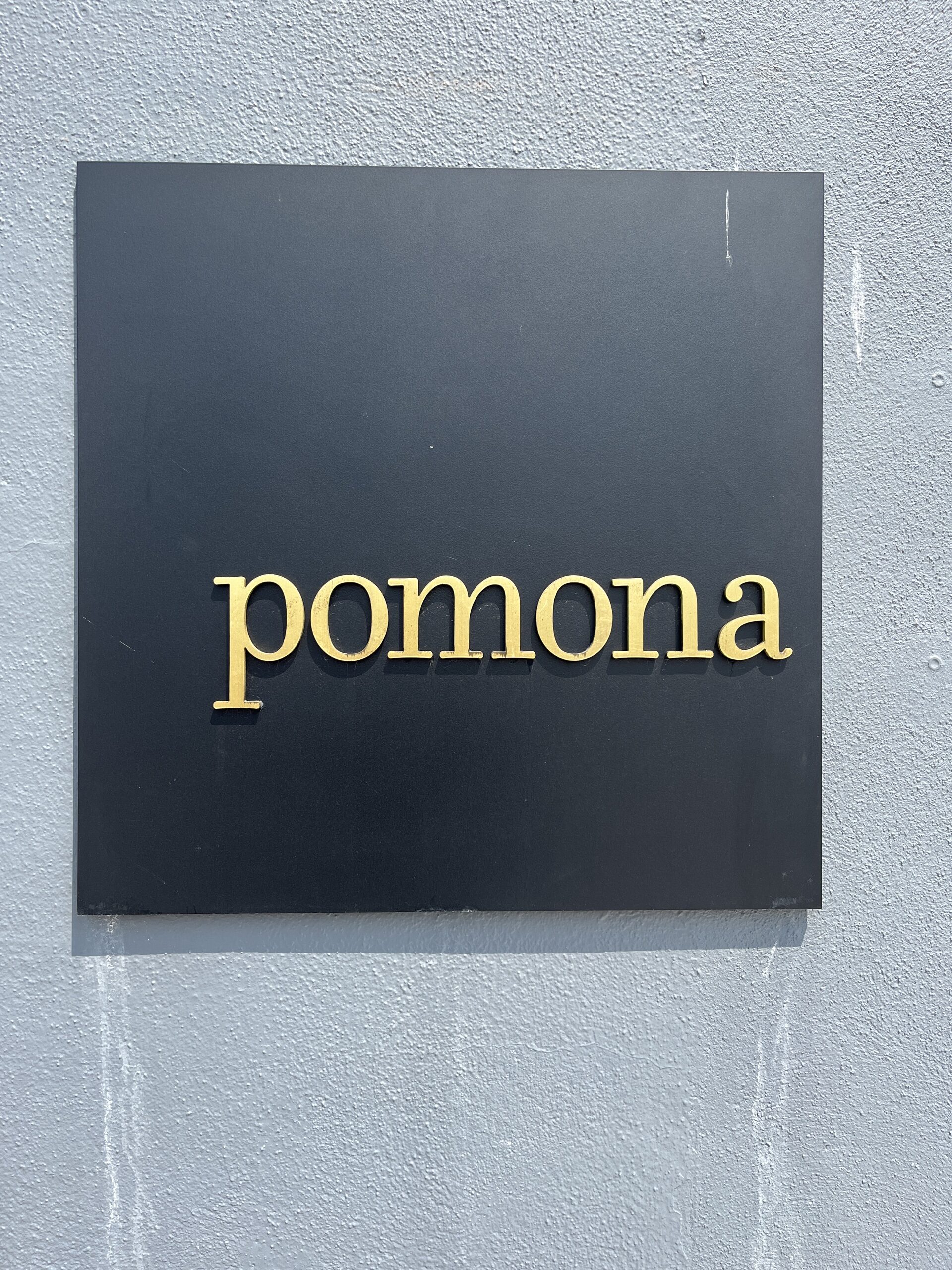 Photo of sign reading "Pomona."
