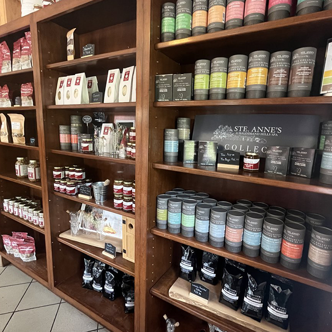 Dark brown shelving displaying a variety of items.