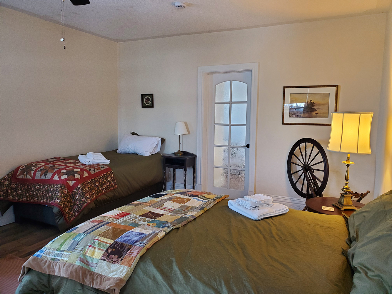 bedroom with quilts on the end of 2 twin beds at a retreat centre