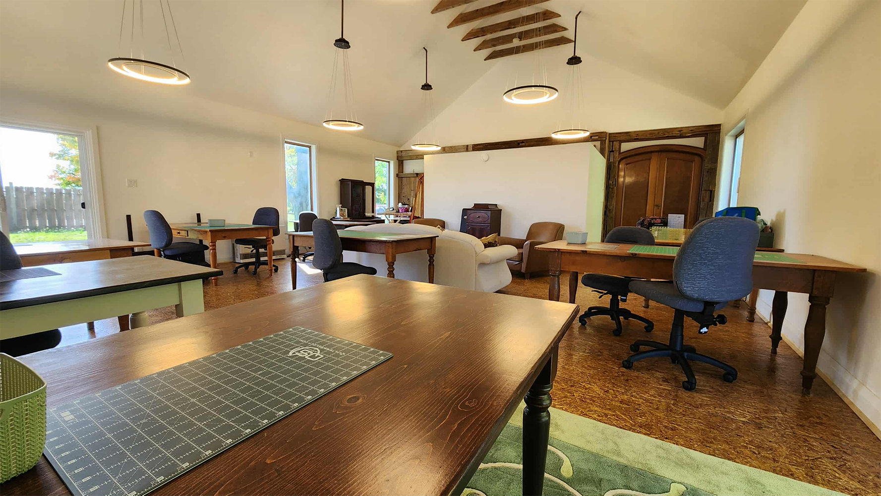 Work tables in a common area at a quilting retreat