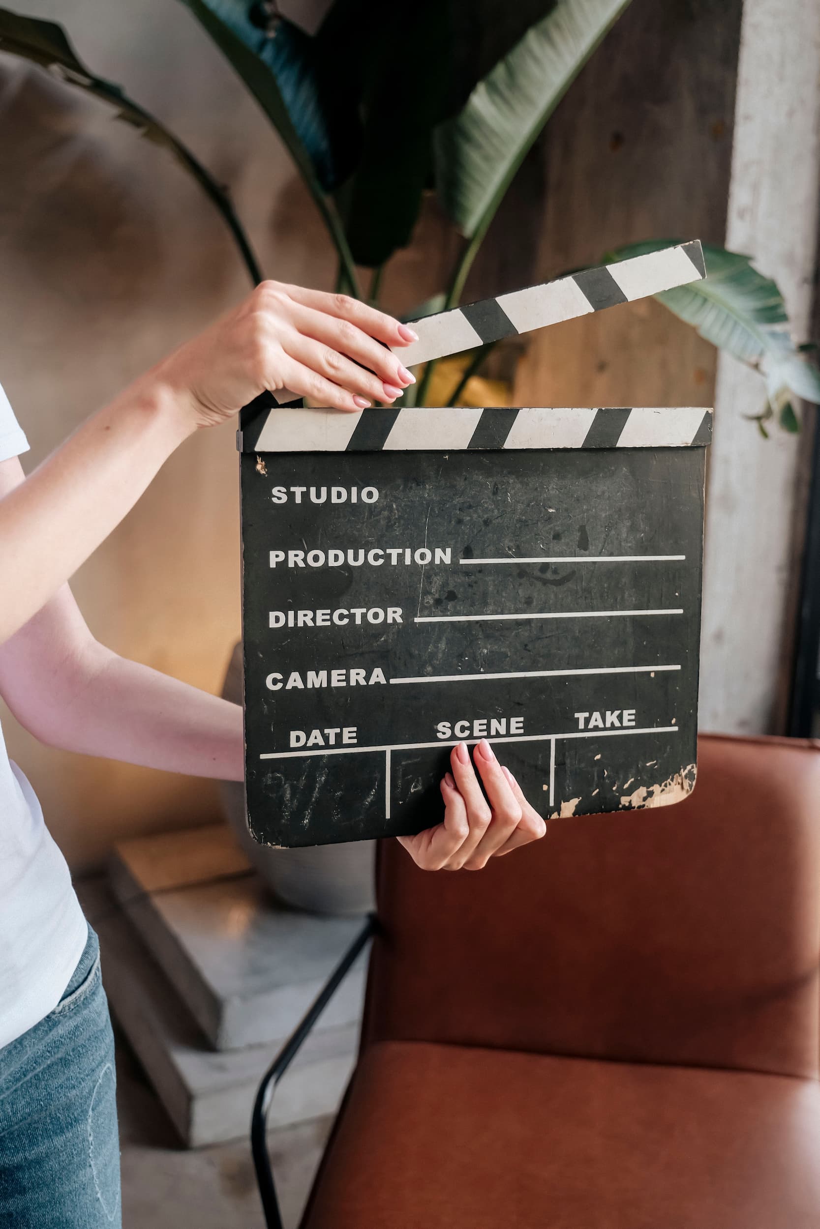 Hands holding a film clapper