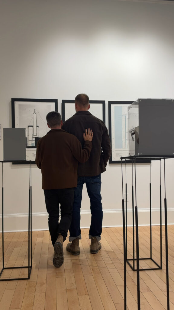 2 men looking at art at the Art Gallery of Northumberland