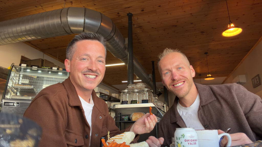 2 men having lunch in a cafe